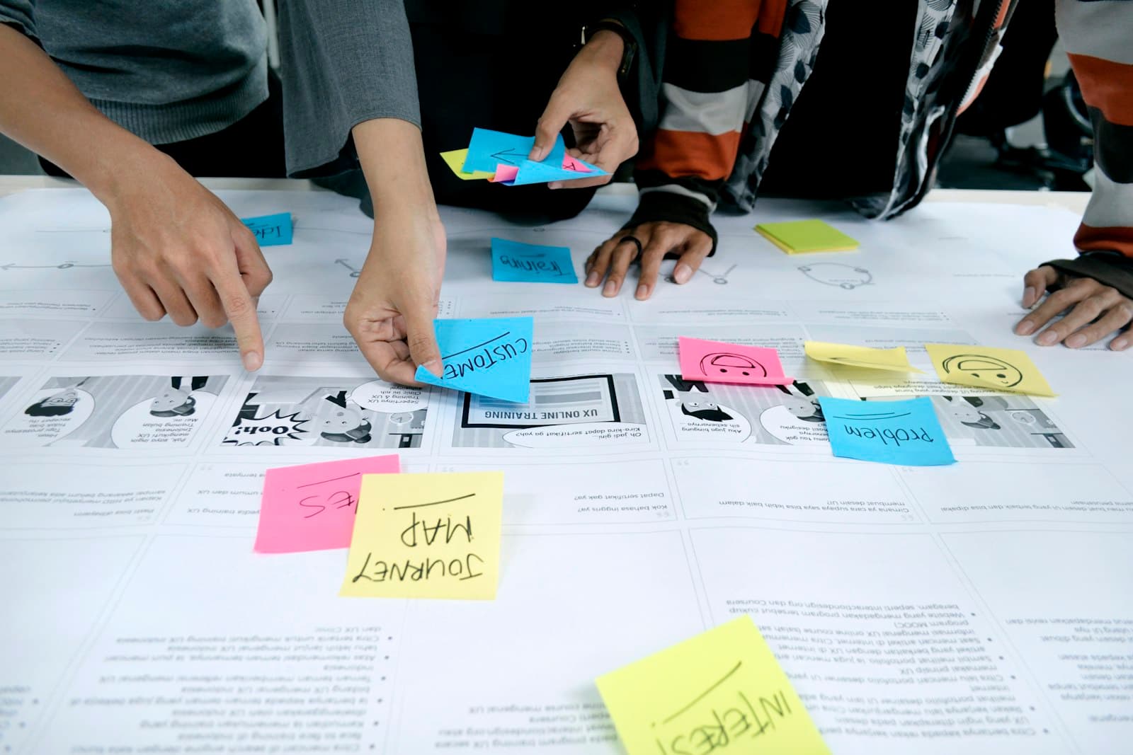 Team mapping AI opportunities on a planning canvas